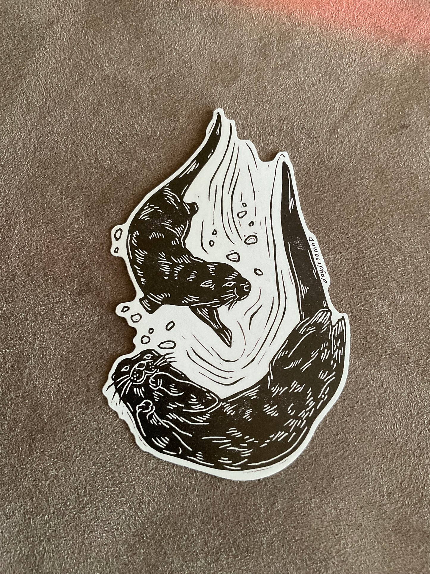 Playful Otters vinyl sticker