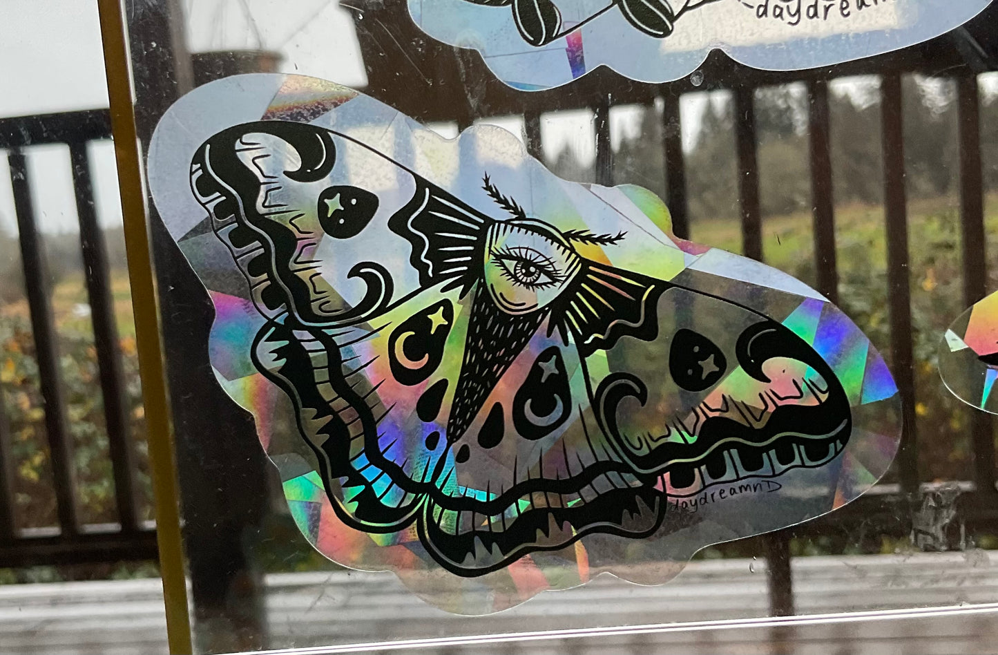 Moth Eye Suncatcher Sticker